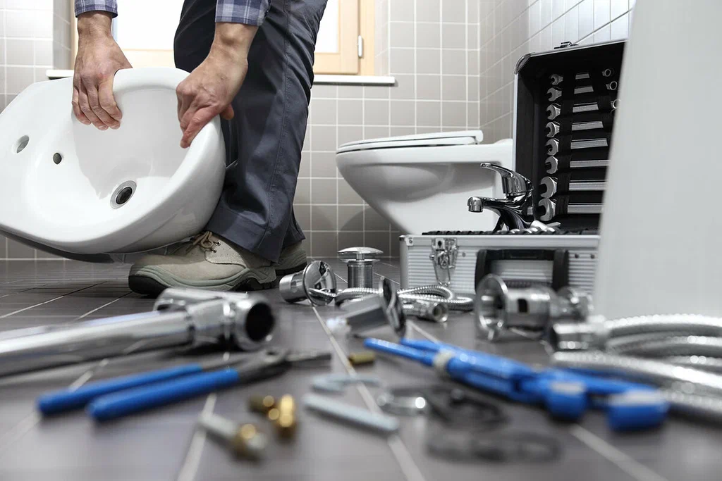 Plumbing tools prepared for a bathroom repair in Coconut Creek